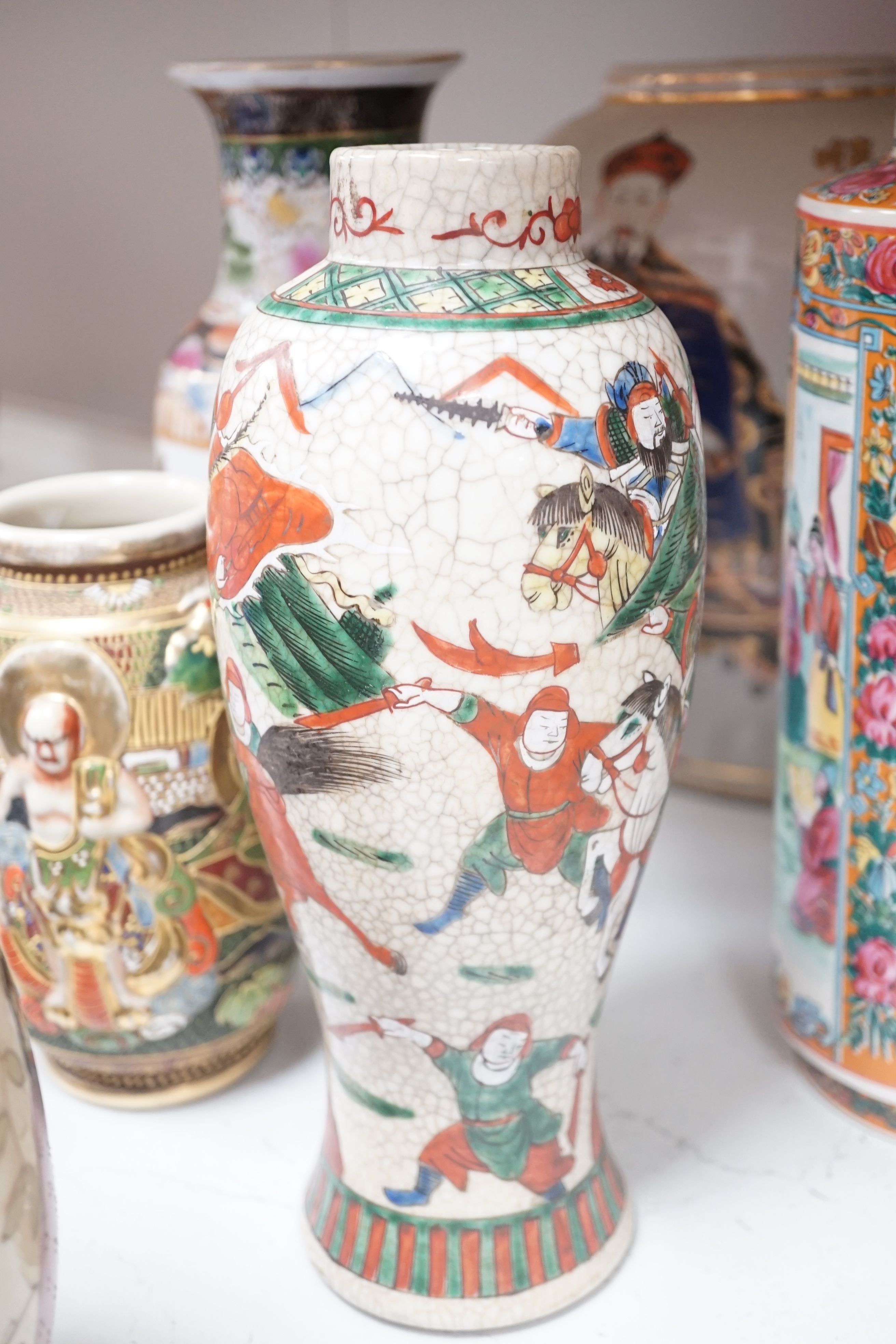 Five Chinese porcelain vases, and three Japanese vases and a resin model of a Buddha, tallest 37cm